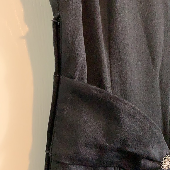 Simple black gown with embellished center. - Picture 3 of 7